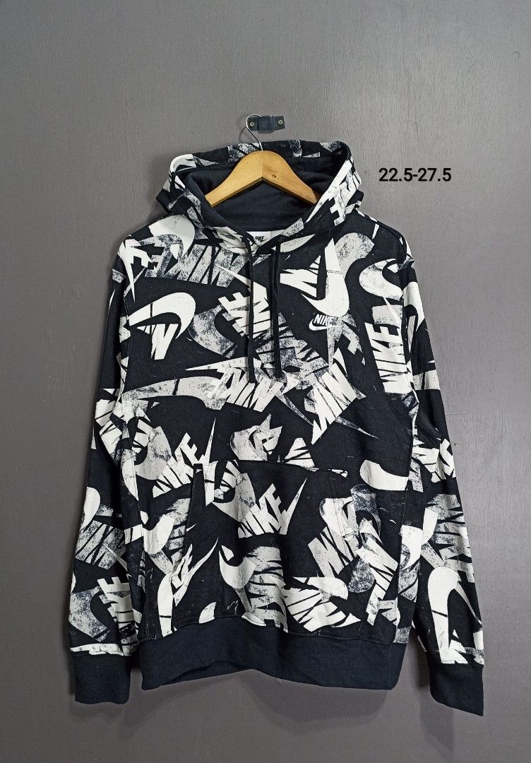 Nike Graphic Hoodie - Size M (Category: Coats, Jackets and Outerwear) located in Marawi City. Submitted by abdullah0692139 (Listing ID 1434788262, Image 1). Description: - Nike hoodie with a unique graphic design - Size: M - Color: Black and White W22.5 L27.5 color 9.9/10 asnew.