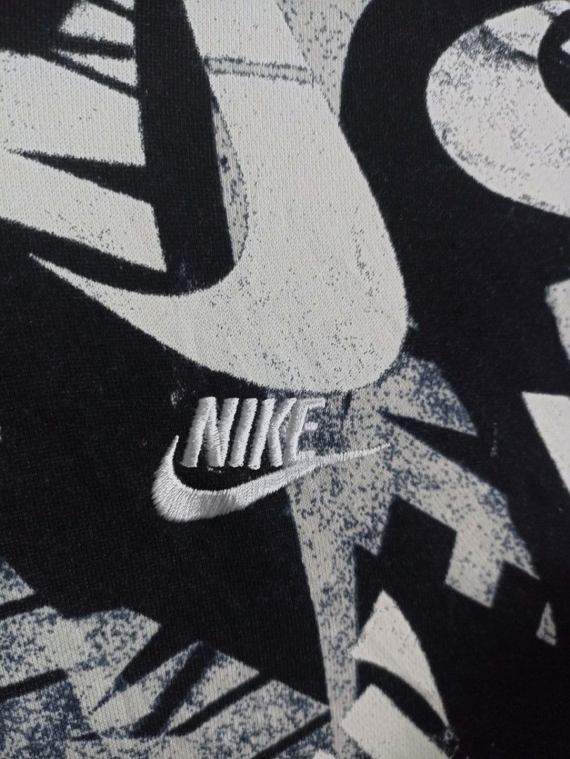 Nike Graphic Hoodie - Size M (Category: Coats, Jackets and Outerwear) located in Marawi City. Submitted by abdullah0692139 (Listing ID 1434788262, Image 3). Description: - Nike hoodie with a unique graphic design - Size: M - Color: Black and White W22.5 L27.5 color 9.9/10 asnew.