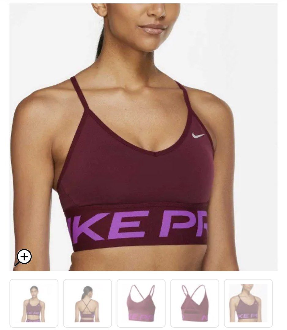 Nike Pro Sports Bra (Category: Activewear) located in La Trinidad. Submitted by avessonjam (Listing ID 1434716714, Image 1). Description: - Nike Pro sports bra - Burgundy color with purple "NIKE PRO" band - Racerback design - Thin straps - Nike logo on front - Made of stretchy material.