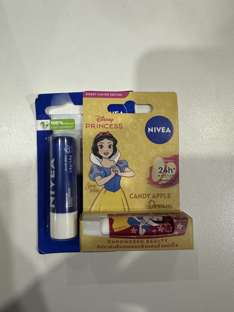 Nivea Lip Balms (Category: Makeup) located in Manila. Submitted by bellevd (Listing ID 1434774108, Image 1). Description: - Nivea Lip Balms - Includes: Original Care & Disney Snow White Candy Apple Dream (Limited Edition) - Moisturizes and protects lips - Original Care: Up to 24-hour care - Expiry: 2028 MOP: Gcash, BPI, GoTyme (No cash payments) .