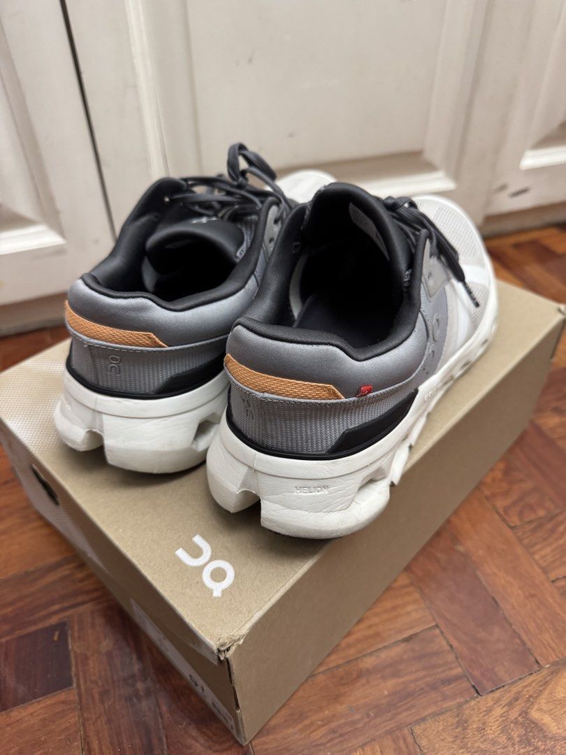 On Cloudrunner 2 - Wolf/Ivory - Size 9 (Category: Sneakers) located in Manila. Submitted by choppee (Listing ID 1434626303, Image 2). Description: - On Cloudrunner 2 running shoes - Color: Wolf/Ivory (grey/white) with black accents - Size: US 9, EU 42.5, JP 27 - Features: - Breathable upper - Cushioned sole - mild stability shoe - Includes original box bought from Tokyo Japan - wore less than 10 times only for malling RFS: Decluttering.