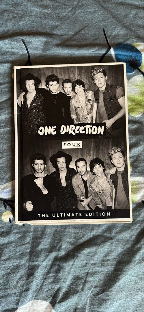 One Direction Four: The Ultimate Edition (Category: CDs & DVDs) located in Iloilo. Submitted by denielle.anne_67 (Listing ID 1434622550, Image 1). Description: - One Direction "Four: The Ultimate Edition" book - Unsealed with CD inside.