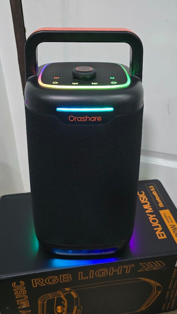 Orashare BS21 Max 100w (Category: Soundbars, Speakers & Amplifiers) located in Malabon City. Submitted by hyrugadgets (Listing ID 1434629752, Image 1). Description: - Orashare Bluetooth Speaker - Built-in RGB lights - Portable design with a handle - Control buttons for volume and playback - Powerful 100W output - Bluetooth 5.3 connectivity - Sleek black design Price: P.2,990 Loc: Malabon Pin: Hyru Gadgets.