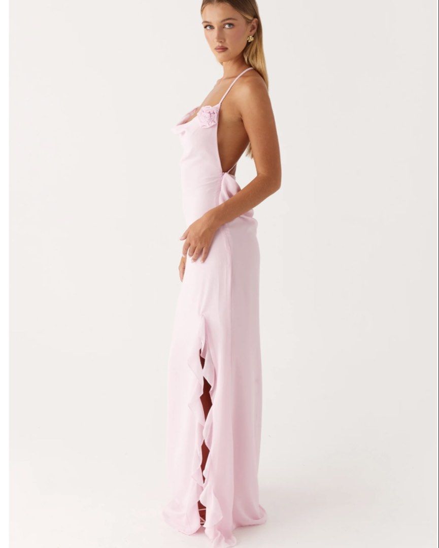 Peppermayo Exclusive First Class Maxi Dress - Pink (Category: Dresses) located in Angeles City. Submitted by shopjules (Listing ID 1434637283, Image 2). Description: First Class Maxi Dress – Step into luxury with this effortlessly chic design. The low front cowl and thin straps offer a delicate, sultry vibe, while the open back creates a show-stopping silhouette. Perfect for making an entrance wherever the night takes you. - Low front cowl - Maxi