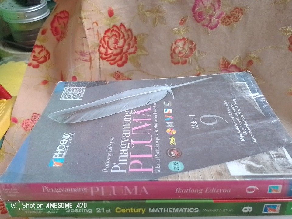 Grade 9 USI books (Category: Textbooks) located in Naga. Submitted by jacklancastera (Listing ID 1434669375, Image 1). Description: - Grade 9 textbooks for sale. - Titles: - Pinagyamang Pluma (Ikatlong Edisyon) - Filipino language and literature. - Soaring 21st Century Mathematics (Second Edition) - Mathematics. - Published by Phoenix Publishing House. - Both books are K to 12 curriculum compliant..