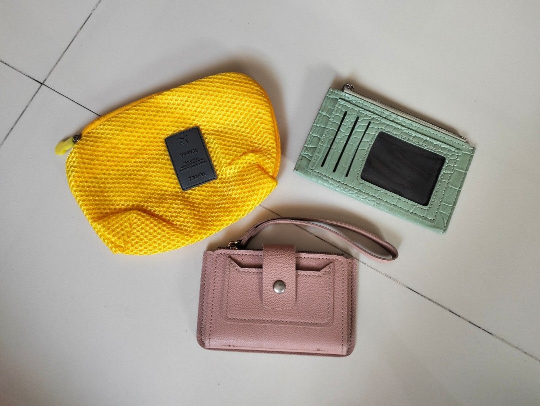 TAKE ALL WALLET / POUCH (Category: Wallets & Card holders) located in San Mateo. Submitted by georgebread (Listing ID 1434655568, Image 1). Description: TAKE ALL for 100 wallet/pouch yellow is brand new, gadget pouch pink is card holder green is one zip wallet open for nego Location: San Mateo, Rizal.