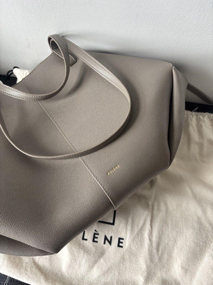 Polène Cyme - Taupe (Category: Luxury Bags & Wallets) located in Quezon City. Submitted by csdmmmm (Listing ID 1434723141, Image 2). Description: - Polène Cyme - Taupe - Structured design - Double handles - Includes matching pouch - Comes with dust bag - Minimalist design - Subtle Polène logo.