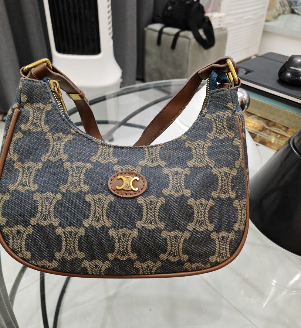 Preloved Celine-Style Hobo Bag (Category: Luxury Bags & Wallets) located in Caloocan City. Submitted by det123123 (Listing ID 1434733559, Image 3). Description: • Good condition, not overused • Classic monogram design • Zipper closure, smooth and working • Sturdy shoulder strap • Clean interior 💼 Perfect for everyday use 📍 Delivery via J&T.