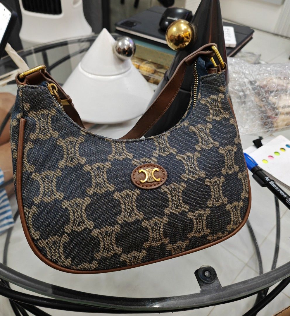 Preloved Celine-Style Hobo Bag (Category: Luxury Bags & Wallets) located in Caloocan City. Submitted by det123123 (Listing ID 1434733559, Image 1). Description: • Good condition, not overused • Classic monogram design • Zipper closure, smooth and working • Sturdy shoulder strap • Clean interior 💼 Perfect for everyday use 📍 Delivery via J&T.