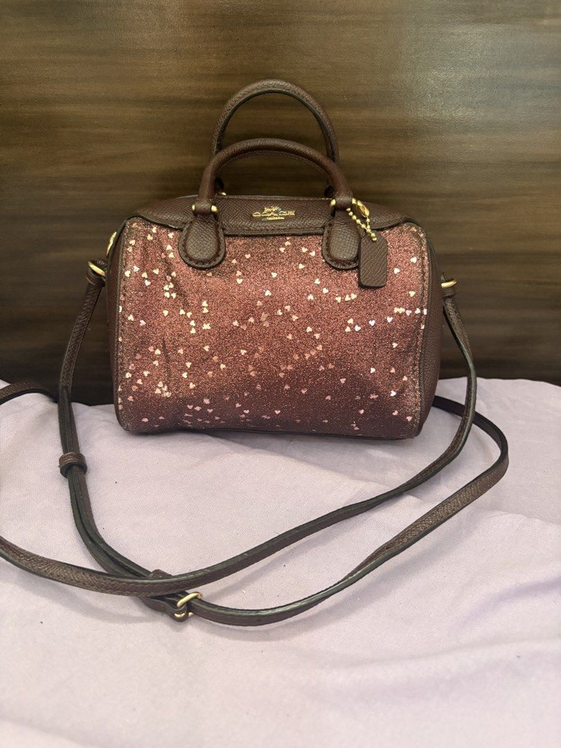 Preloved Coach Bennett Micro Sling Bag (Category: Cross-body Bags) located in Lipa City. Submitted by stellar_things (Listing ID 1434624024, Image 1). Description: May bakbak sa creed Tarnished hardwares.