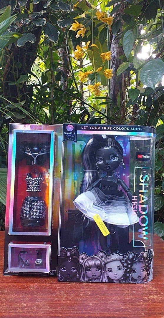 Rainbow High Shadow High Shanelle Onyx Doll (Category: Kids Toys) located in Midsayap. Submitted by AiHaibara. (Listing ID 1434663347, Image 1). Description: - Rainbow High Shadow High Shanelle Onyx doll - Includes a second outfit - Comes with accessories - Features black skin and black/silver hair - Wearing a black and white dress - Box is sealed - Includes YouTube logo +Sf.