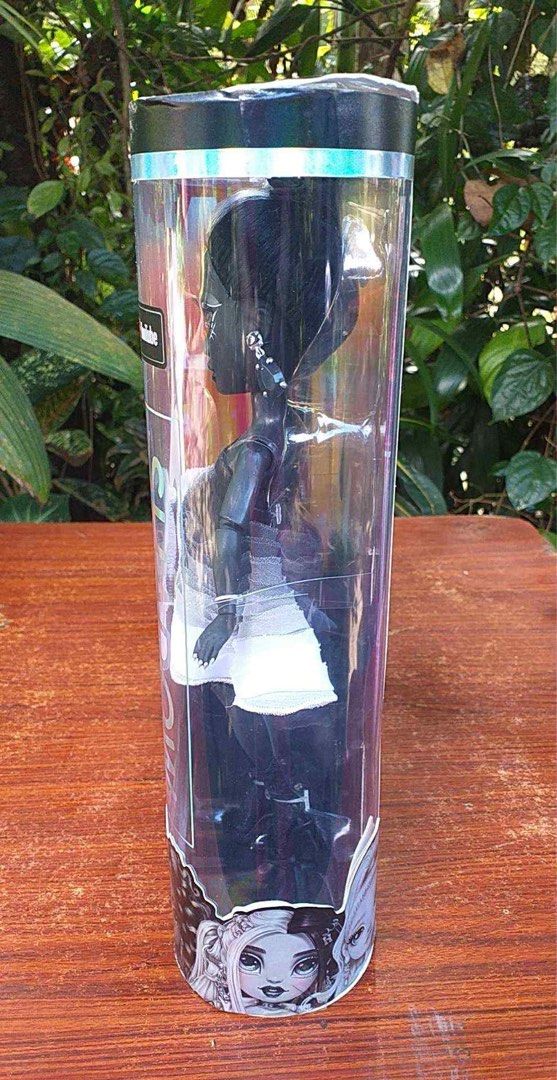 Rainbow High Shadow High Shanelle Onyx Doll (Category: Kids Toys) located in Midsayap. Submitted by AiHaibara. (Listing ID 1434663347, Image 2). Description: - Rainbow High Shadow High Shanelle Onyx doll - Includes a second outfit - Comes with accessories - Features black skin and black/silver hair - Wearing a black and white dress - Box is sealed - Includes YouTube logo +Sf.