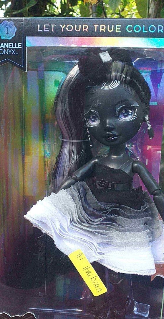 Rainbow High Shadow High Shanelle Onyx Doll (Category: Kids Toys) located in Midsayap. Submitted by AiHaibara. (Listing ID 1434663347, Image 3). Description: - Rainbow High Shadow High Shanelle Onyx doll - Includes a second outfit - Comes with accessories - Features black skin and black/silver hair - Wearing a black and white dress - Box is sealed - Includes YouTube logo +Sf.