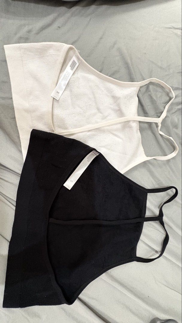 Ribbed Tank Top - Black and White (Category: Sleeveless) located in Dasmarinas. Submitted by the351. (Listing ID 1434700242, Image 2). Description: - Set includes two tank tops: black and white - Size: Small - Design: Halter neck with thin straps - Features: - Textured ribbed pattern.