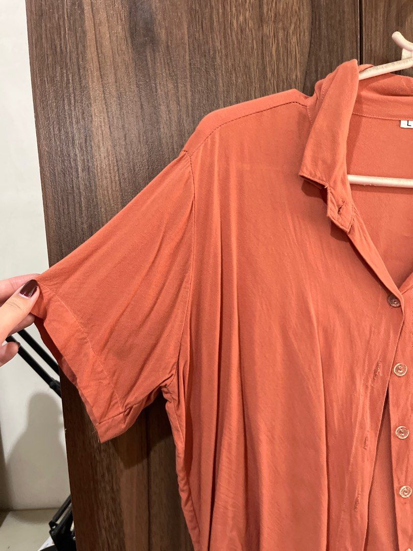 Rust Orange Button Down (Large) (Category: Blouses) located in Angeles City. Submitted by mdxnix (Listing ID 1434615821, Image 2). Description: - Size: Large as per label (can fit Medium to Large body frames) - Free of any purchase - needs ironing - Condition: 6/10 - RFS: no longer wearing 📍Angeles City, Pampanga Please manage your expectations. This is a used clothing item. - The color of the item may vary slightly due to photographic lighting 