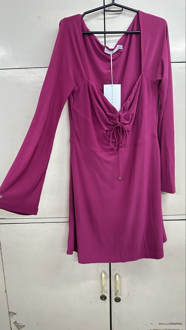 Saints & Secrets Plum Dress AU 12 (Category: Dresses) located in Malabon City. Submitted by xeniag (Listing ID 1434782365, Image 2). Description: - Saints & Secrets plum dress - Size: AU 12 / US L - Long sleeves - Unique drawstring neckline - Flattering silhouette - Perfect for various occasions - New with tags.