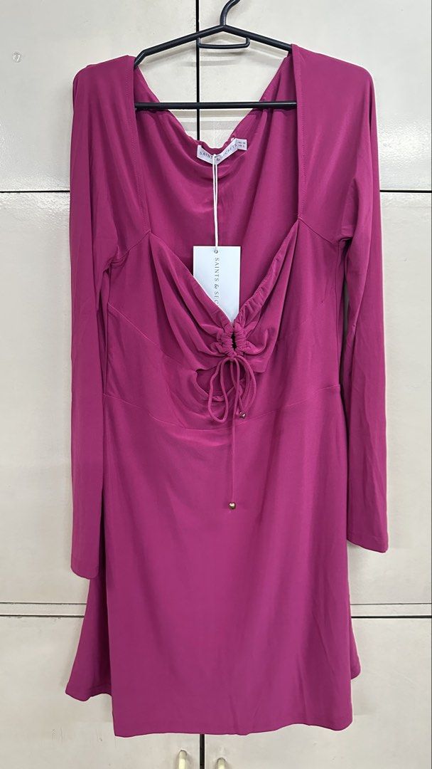 Saints & Secrets Plum Dress AU 12 (Category: Dresses) located in Malabon City. Submitted by xeniag (Listing ID 1434782365, Image 1). Description: - Saints & Secrets plum dress - Size: AU 12 / US L - Long sleeves - Unique drawstring neckline - Flattering silhouette - Perfect for various occasions - New with tags.