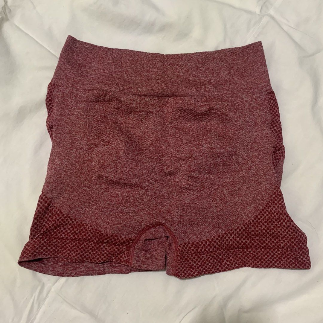 Seamless Workout Shorts (Category: Activewear) located in Naga. Submitted by dayaruee (Listing ID 1434618790, Image 1). Description: - Seamless workout shorts - High-waisted design - Ruched back for a flattering fit - Breathable, textured fabric - Deep maroon color with subtle pattern - Perfect for workouts.