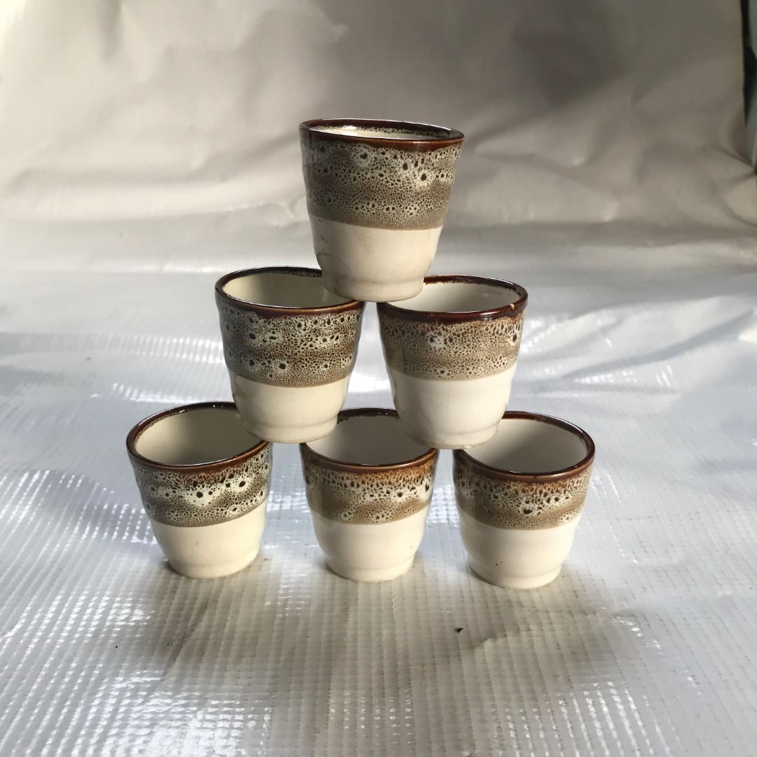 Set of 6 Ceramic Mini Cups #4499 (Category: Coffee & Tea Tableware) located in Malabon City. Submitted by mldg.surplus (Listing ID 1434719730, Image 1). Description: - Set of 6 ceramic cups - Unique two-tone design: cream base, speckled brown upper - Brown rim - Small size, ideal for espresso or small portions - Stackable for easy storage MLDG Surplus Reminder: •Expect minimal flaws such as stain, lint, scratches etc. •No reservation, we can acce