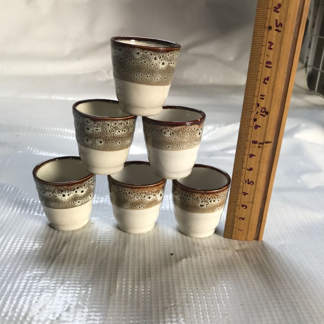 Set of 6 Ceramic Mini Cups #4499 (Category: Coffee & Tea Tableware) located in Malabon City. Submitted by mldg.surplus (Listing ID 1434719730, Image 2). Description: - Set of 6 ceramic cups - Unique two-tone design: cream base, speckled brown upper - Brown rim - Small size, ideal for espresso or small portions - Stackable for easy storage MLDG Surplus Reminder: •Expect minimal flaws such as stain, lint, scratches etc. •No reservation, we can acce
