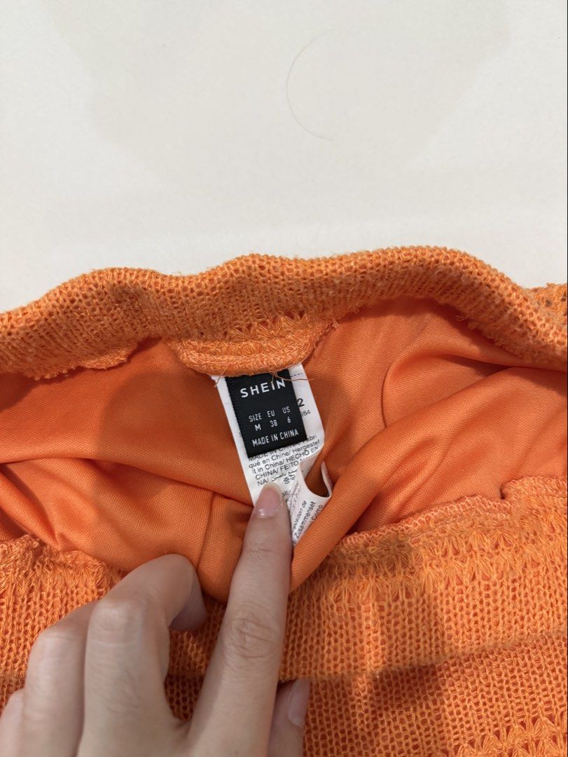 Shein Knitted Shorts Orange Coverup (Category: Shorts) located in Makati City. Submitted by nochuuu (Listing ID 1434623302, Image 2). Description: Used twice Good condition Fits M-L frame.