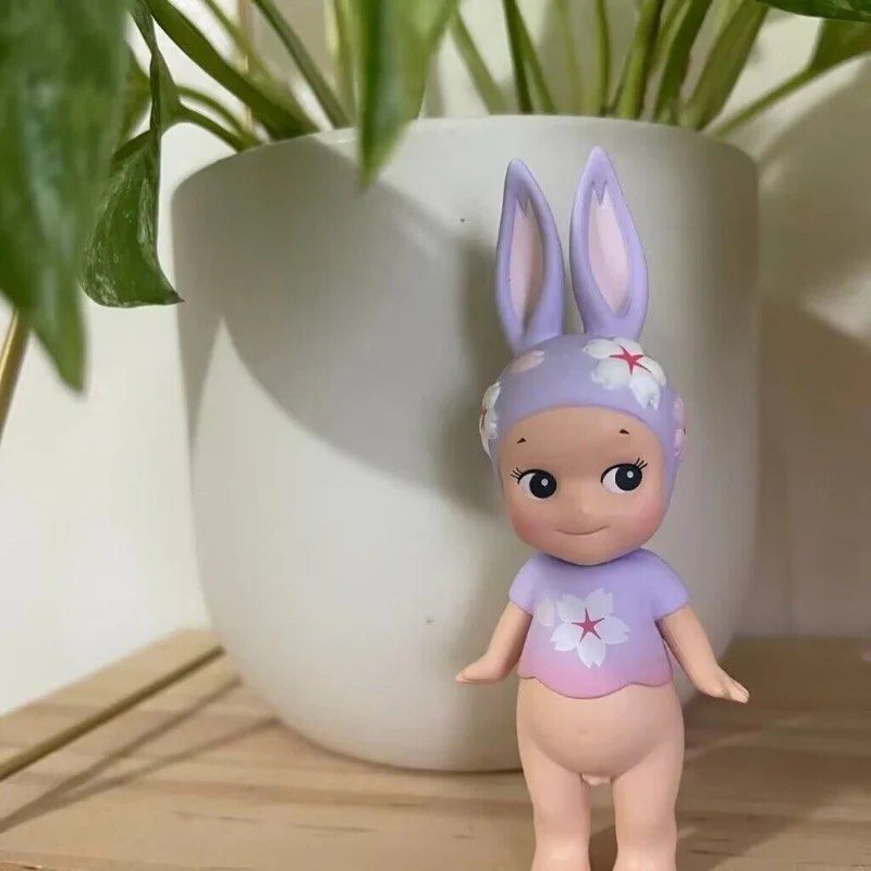 Sonny Angel Cherry Blossom Bunny Figurine (Category: Designer & Blind Box Toys) located in Singapore. Submitted by purplepinkjelly (Listing ID 1434721516, Image 1). Description: - Sonny Angel Cherry Blossom series figurine - Features a bunny - Adorable expression - Perfect for collectors or decor.