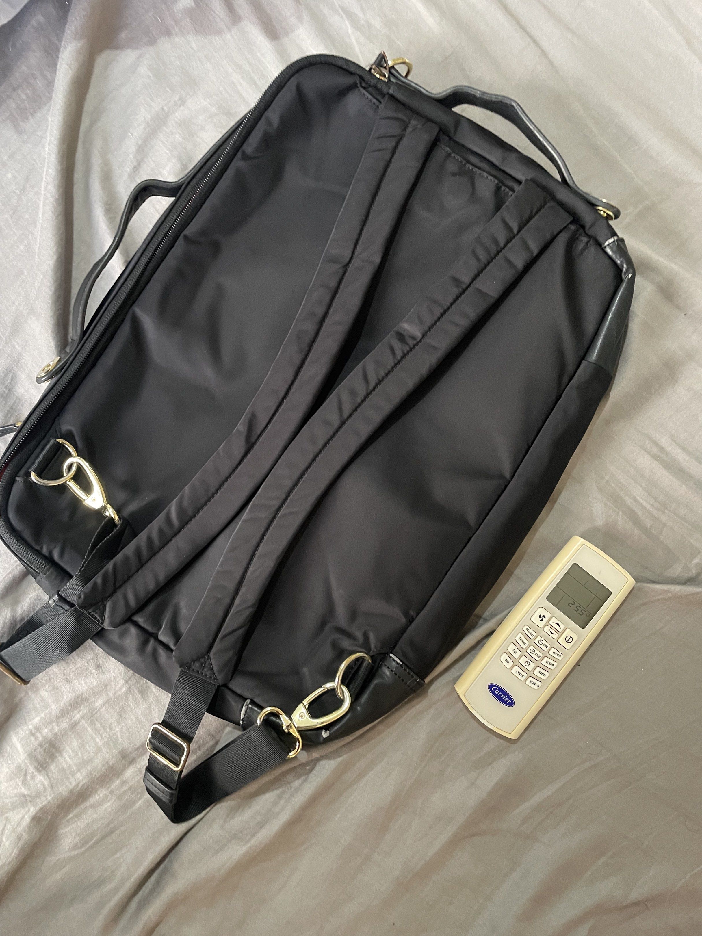 Targus Black Backpack (Category: Backpacks) located in Santa Barbara. Submitted by frryt (Listing ID 1434601609, Image 2). Description: - Black Targus backpack - Orange interior - Multiple compartments - Zippered closure - Adjustable shoulder straps - Top handle - Sleek design - Leather accents - Interior zippered pocket - Targus label.