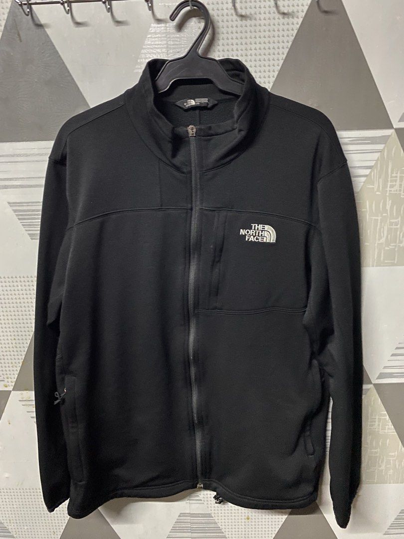 The North Face Black Jacket (Category: Coats, Jackets and Outerwear) located in Quezon City. Submitted by natesm (Listing ID 1434787724, Image 1). Description: - The North Face black jacket - Size: L/G - Features: - Full zip closure - Small logo on chest - Two side pockets - High collar - Drawstring at bottom hem issue: zipper (see picture 3).