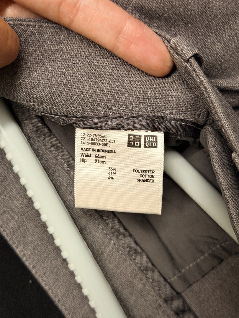 Uniqlo Gray Pants trousers (Category: Other Bottoms) located in Makati City. Submitted by ally1914 (Listing ID 1434713550, Image 2). Description: - Uniqlo pants - Made in Indonesia - Waist: 64cm, Hip: 91cm, Length: 80cm - Material: 55% polyester, 41% cotton, 4% spandex - Classic straight-leg design - Features side pockets - Versatile for casual or polished looks.