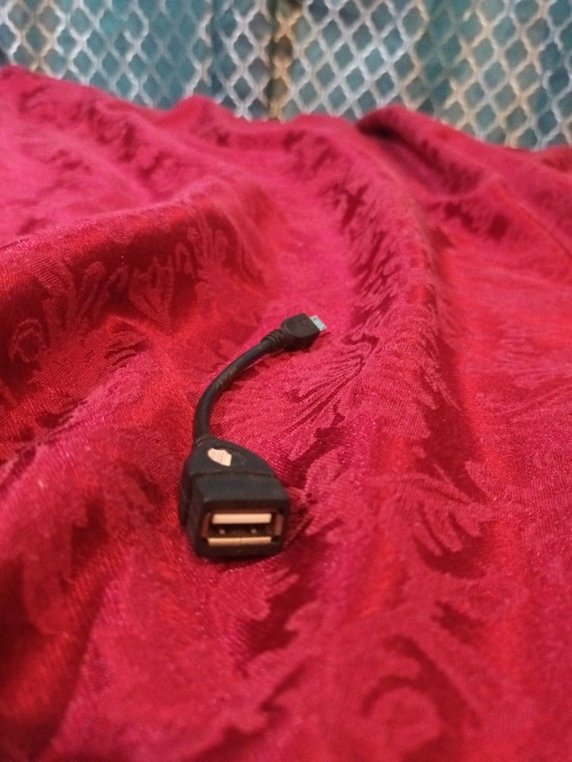 USB to Micro USB Adapter (Category: Cables & Adaptors) located in Makati City. Submitted by epic_prelovedmakati (Listing ID 1434631168, Image 2). Description: - USB to Micro USB Adapter - Black color - Converts USB to micro USB - Connect devices with micro USB to standard USB - For charging and data transfer - Compact and convenient.