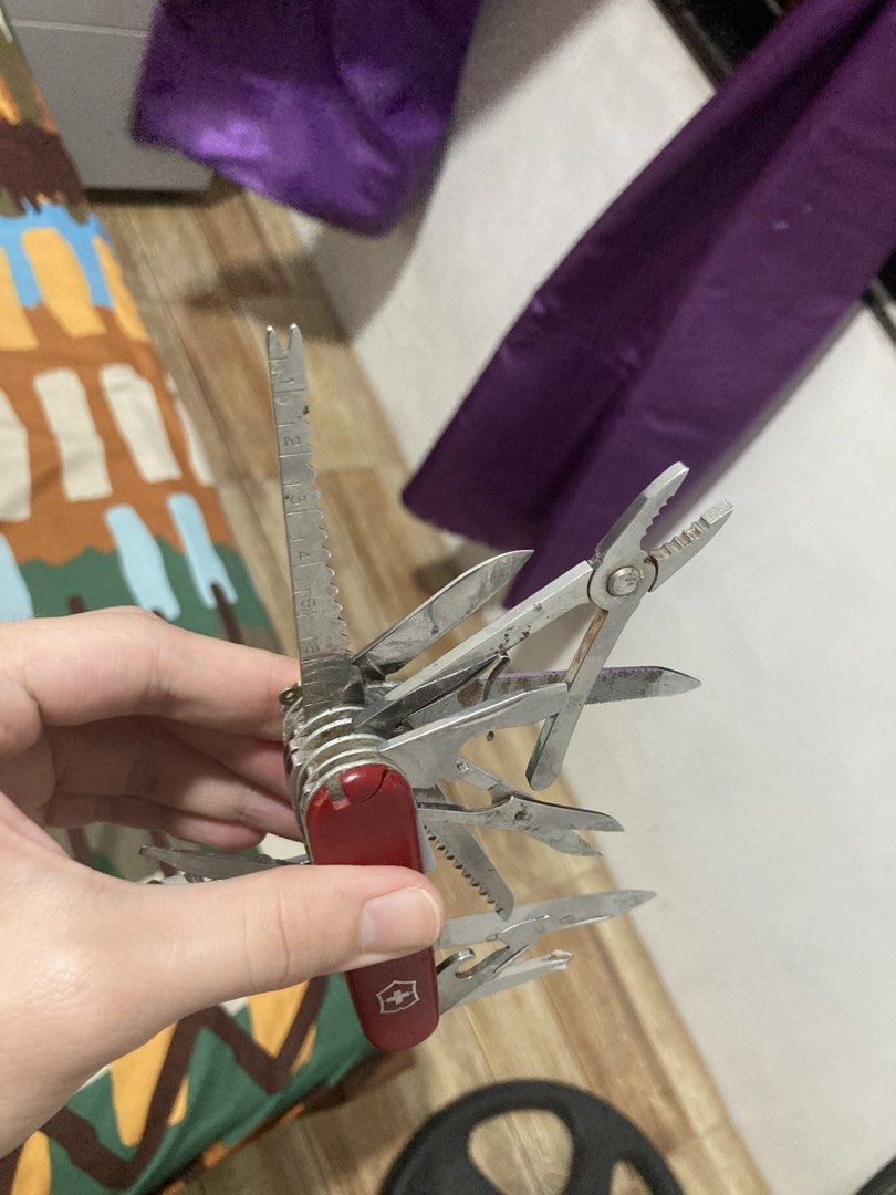 Victorinox Swiss Champ (Category: Stationery & School Supplies) located in Paranaque City. Submitted by southside.watchco (Listing ID 1434799943, Image 3). Description: - Authentic Victorinox Swiss Army Knife - Iconic red handle with Swiss cross emblem - Includes a variety of tools: knife, scissors, saw, pliers, and more - Compact and versatile design - Perfect for various tasks and everyday carry.