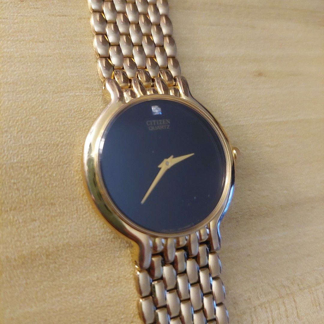 Vintage Citizen Quartz Watch (Category: Women's Watches) located in Marikina City. Submitted by mackbear (Listing ID 1434682560, Image 3). Description: - Round face with clasp closure -15 cm wrist, with additional links can probably adjust to 15.24 cm (6 in) -pre loved, good condition, no visible scratches, with some scratches in back case A refined vintage Citizen quartz dress watch, estimated from the 1990s era, showcasing timeless Japanese cra