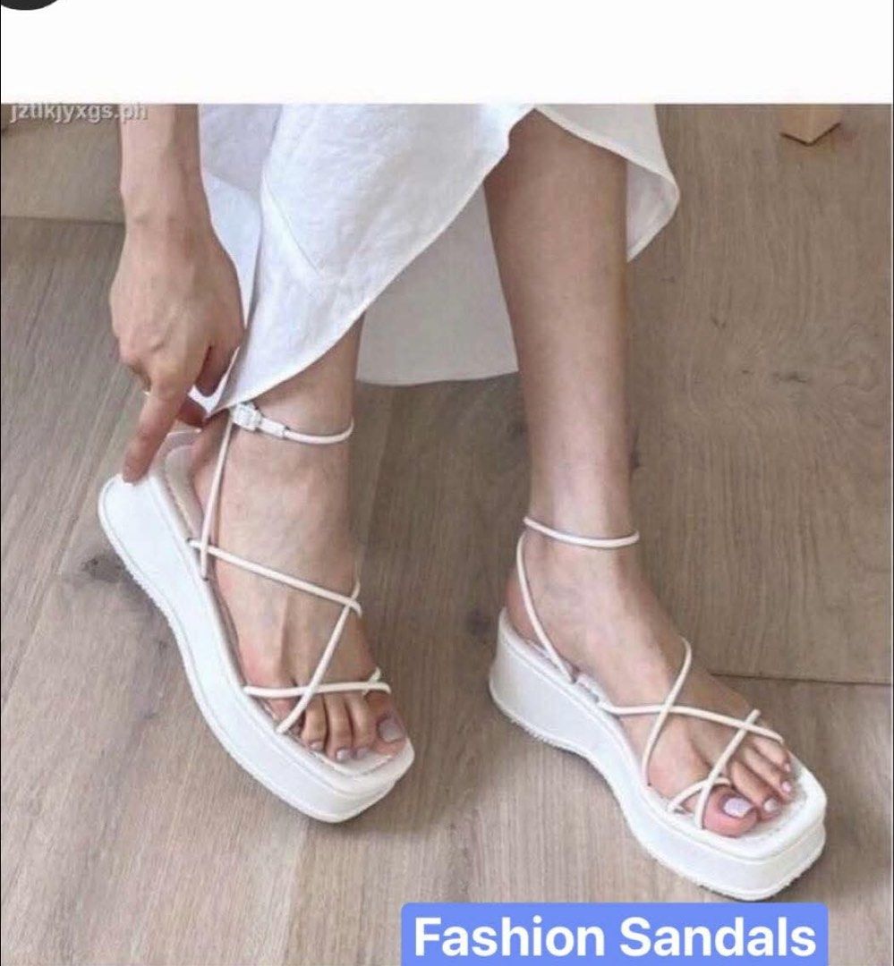 White Platform Sandals (Category: Flats & Sandals) located in Valenzuela. Submitted by 2ndHandSpree (Listing ID 1434616036, Image 1). Description: - White platform sandals - Strappy design - Ankle strap for secure fit - Platform sole for height and comfort - Suitable for casual and dressy outfits.