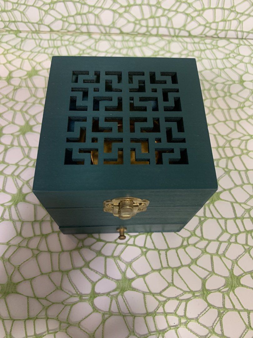 Wooden Incense Burner Box Incense Case (Category: Storage Boxes & Baskets) located in Makati City. Submitted by newandlovedco. (Listing ID 1434614893, Image 3). Description: - Teal wooden box - Decorative geometric design on top - Brass-colored latch - Small drawer with red felt lining - Gold-colored metal bowl inside - Functional: Opens and closes 📍 Location: Mandaluyong City 🚚 Delivery Options: • Lalamove • Grab Express • J&T Express 💳 Mode 