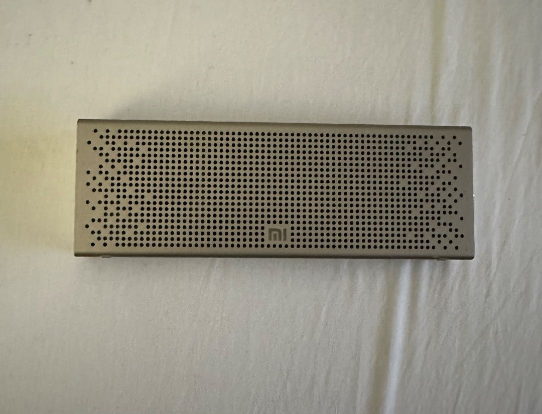 Xiaomi Mi Bluetooth Speaker (Category: Soundbars, Speakers & Amplifiers) located in San Juan City. Submitted by looneybin559 (Listing ID 1434627312, Image 1). Description: - Xiaomi Mi Bluetooth Speaker - Sleek, portable design - Silver color - Perforated metal build with Xiaomi logo - AUX input and micro-USB port - Volume and playback control buttons - No box Used once. Just kept in storage. WYSIWYG. ***ITEM IS AVAILABLE IF YOU CAN SEE THIS MESSA