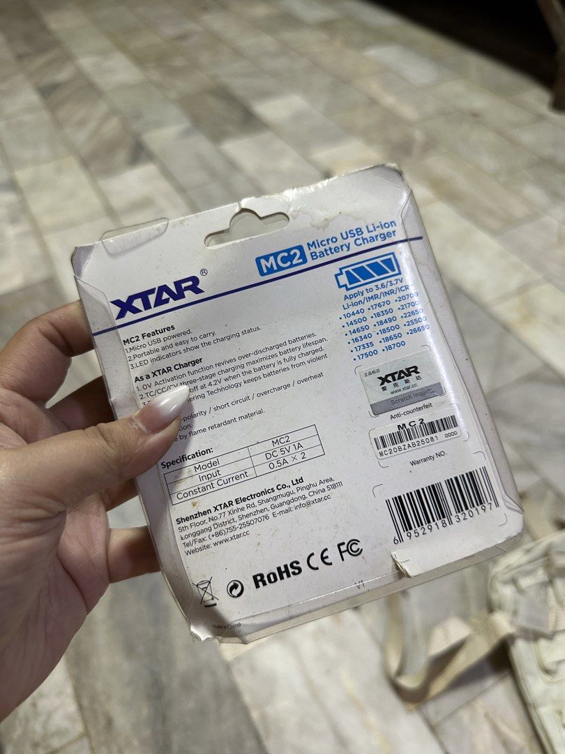 XTAR MC2 Micro USB Li-ion Battery Charger (Category: Chargers & Cables) located in Manila. Submitted by salmongirl88 (Listing ID 1434766233, Image 2). Description: - XTAR MC2 Battery Charger - Compact design with Micro USB charging - Charges two batteries independently - Compatible with 3.6/3.7V Li-ion batteries - Input: DC 5V 1A - Constant Current: 0.5A x 2 - Includes charger and USB cable.