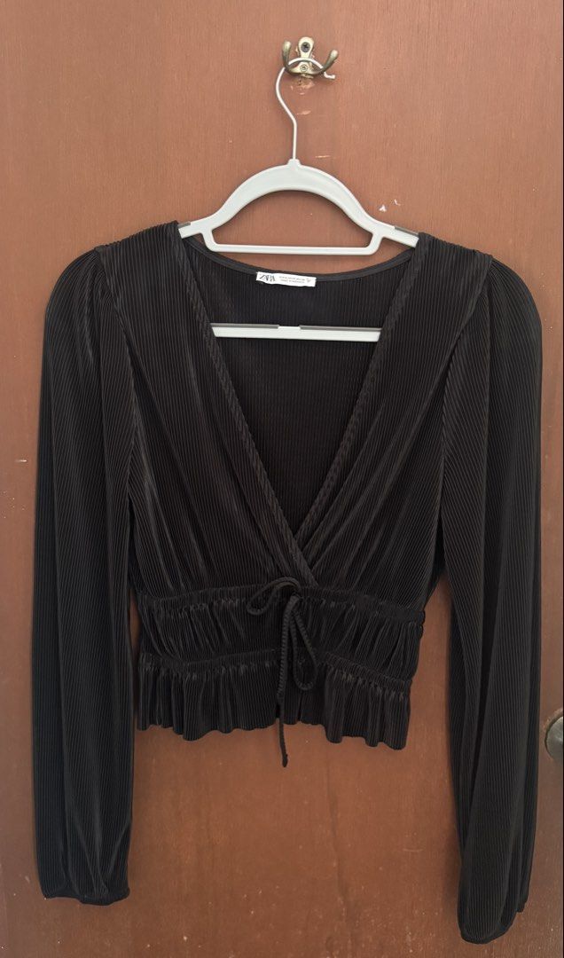 Zara Black Pleated Long Sleeve Top (Category: Blouses) located in Paranaque City. Submitted by migvee (Listing ID 1434678951, Image 2). Description: - Zara black pleated blouse - Size: S - Features: - V-neckline - Long sleeves - Waist tie detail - Made in Morocco Light and breathable material..