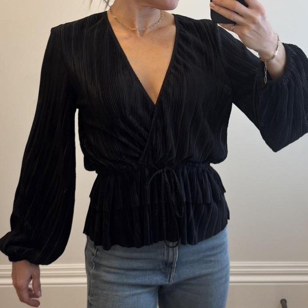 Zara Black Pleated Long Sleeve Top (Category: Blouses) located in Paranaque City. Submitted by migvee (Listing ID 1434678951, Image 1). Description: - Zara black pleated blouse - Size: S - Features: - V-neckline - Long sleeves - Waist tie detail - Made in Morocco Light and breathable material..