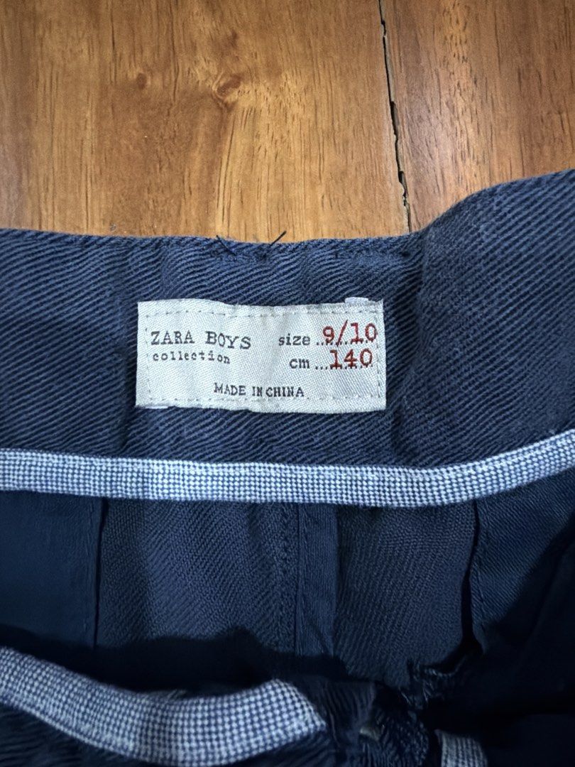 Zara Boys Navy Blue Pants Size 9/10 (Category: Babies & Kids Fashion) located in Las Pinas. Submitted by oliveguns (Listing ID 1434761508, Image 3). Description: - Zara Boys Navy Blue Pants - Size: 9/10 - Waist: 12 inches - Inseam: 32 inches - Zipper closure, pleats at the front - Soft material.