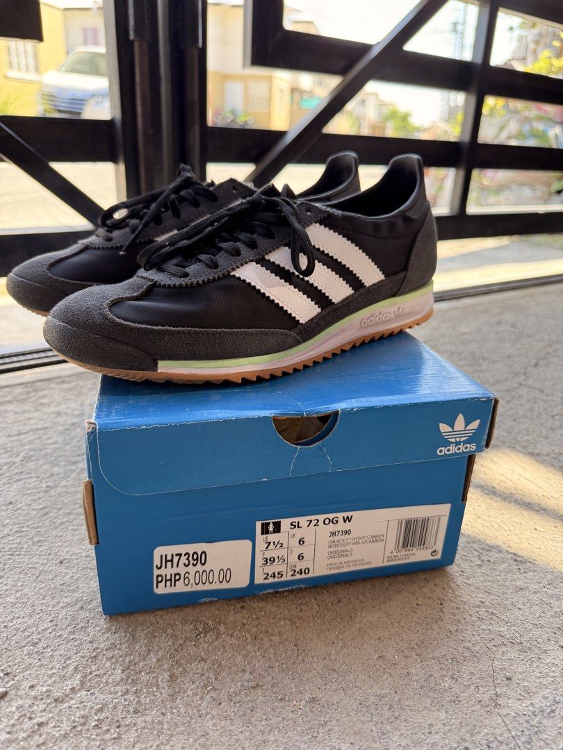 Adidas SL 72 OG W Sneakers (Category: Sneakers) located in Imus. Submitted by arakatrina000 (Listing ID 1434962842, Image 1). Description: - Adidas SL 72 OG W sneakers - Black and white colorway - Features Adidas three stripes - Size: US 7.5, UK 6 - no box - Black and grey color scheme with green and brown sole.