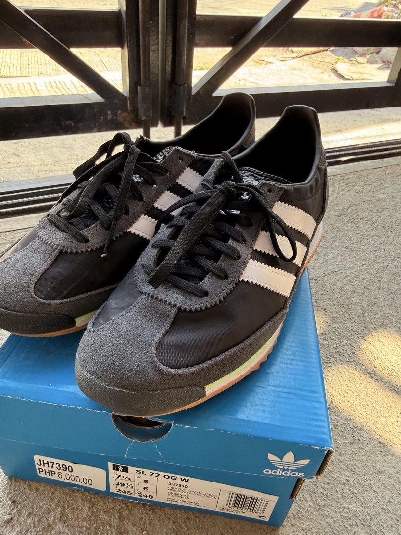 Adidas SL 72 OG W Sneakers (Category: Sneakers) located in Imus. Submitted by arakatrina000 (Listing ID 1434962842, Image 2). Description: - Adidas SL 72 OG W sneakers - Black and white colorway - Features Adidas three stripes - Size: US 7.5, UK 6 - no box - Black and grey color scheme with green and brown sole.