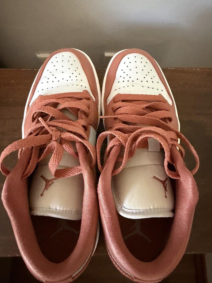 Air Jordan 1 Low - Terracotta (Category: Sneakers) located in Makati City. Submitted by blushvanilla (Listing ID 1434821690, Image 3). Description: - Air Jordan 1 Low sneakers - Color: Terracotta and white - Iconic Nike swoosh - Air Jordan wings logo on the heel - White midsole - Terracotta outsole - Terracotta-colored laces - Perforated toe box for breathability.