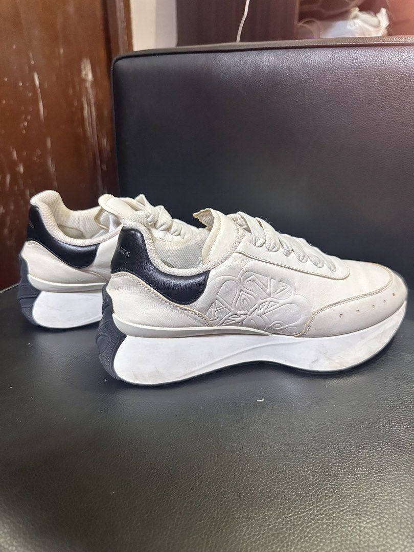 Alexander McQueen Oversized Sneakers (Category: Sneakers) located in Manila. Submitted by eeceec (Listing ID 1434877254, Image 2). Description: - Original Alexander McQueen oversized sneakers. Bought in Singapore. - White with black accents - Alexander McQueen logo on tongue and heel - Includes dust bag and extra black laces - Chunky sole design - Needs cleaning. Never cleaned and lace never changed or removed. .