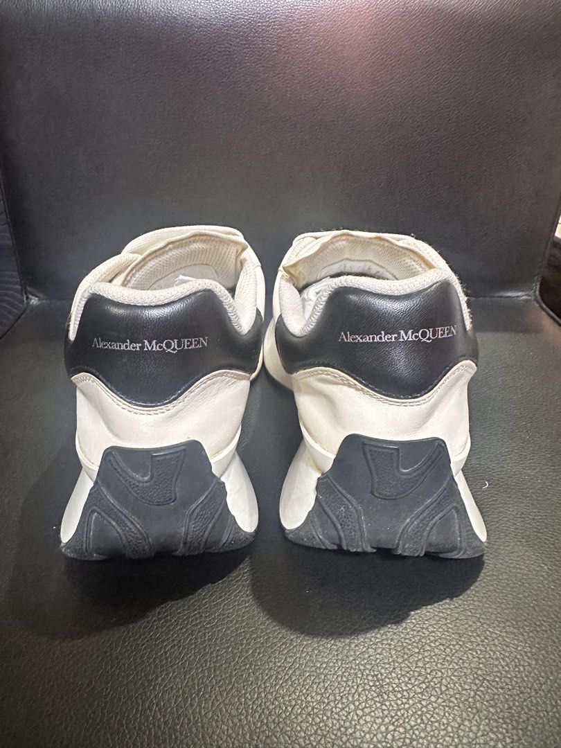 Alexander McQueen Oversized Sneakers (Category: Sneakers) located in Manila. Submitted by eeceec (Listing ID 1434877254, Image 3). Description: - Original Alexander McQueen oversized sneakers. Bought in Singapore. - White with black accents - Alexander McQueen logo on tongue and heel - Includes dust bag and extra black laces - Chunky sole design - Needs cleaning. Never cleaned and lace never changed or removed. .