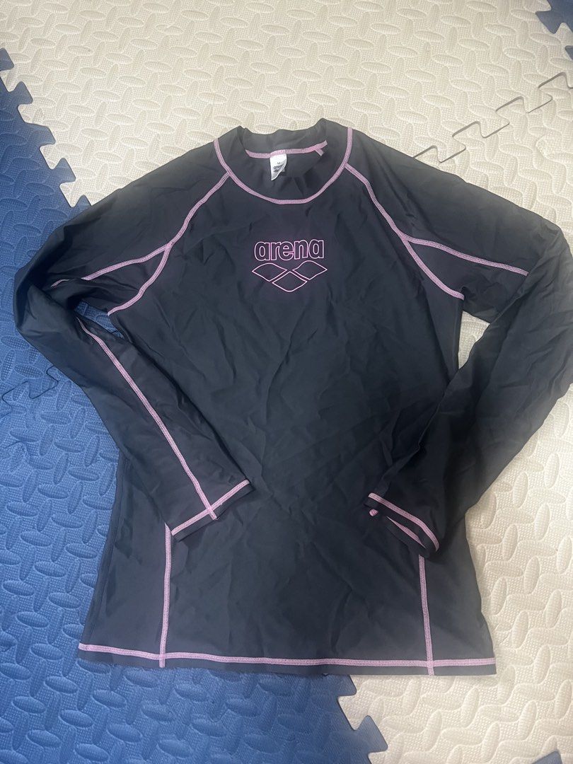 Arena Rash Guard - Black and Pink (Category: Rash guard) located in Malabon City. Submitted by bini_mini (Listing ID 1434905089, Image 1). Description: - Arena rash guard - Color: Black with pink stitching - Size: M - Features Arena logo - Long-sleeved - Perfect for swimming and water activities - Stretchy material - Provides sun protection.