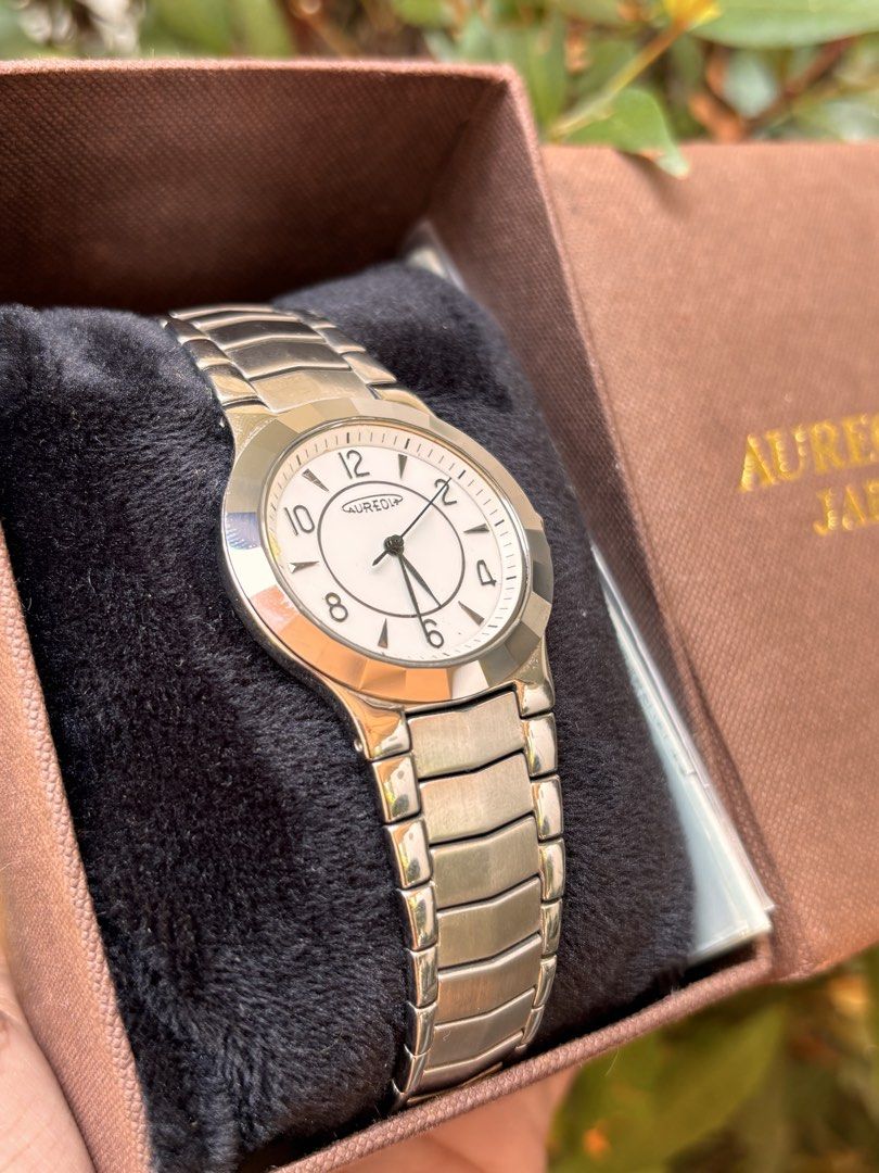 Aureole Japan Watch (Category: Women's Watches) located in Tuguegarao City. Submitted by jeremymanuel0104 (Listing ID 1434976169, Image 2). Description: - Aureole Japan watch - Silver-tone bracelet - White dial - Original box included - Classic design - Clear numerals and hands.
