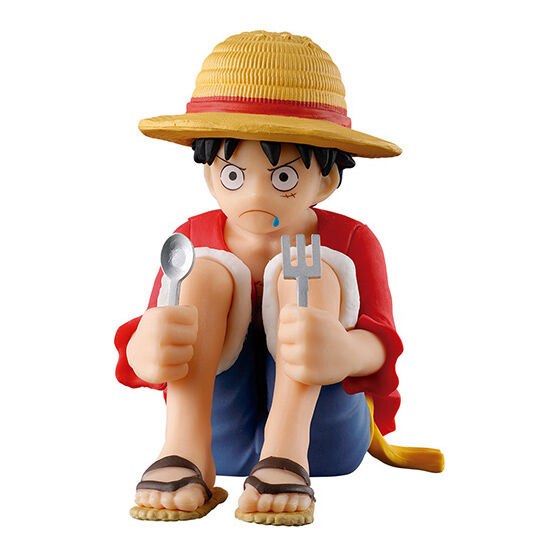 Bandai Gashapon One Piece Still Waiting For You Luffy Figure (Category: Figurines & Statues) located in Makati City. Submitted by hyperdrive_mnl (Listing ID 1434936816, Image 1). Description: - Bandai One Piece figure: Luffy - Pose: Luffy sitting with a spoon and fork - Includes: Original capsule - Packaging: Displays other figures from the collection - Height: Approximately 15.2 cm.