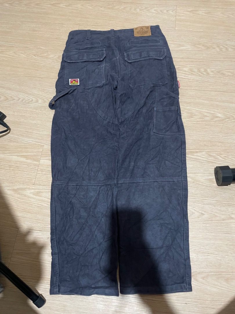 Ben Davis Cargo Pants (Category: Jeans) located in Sorsogon. Submitted by solayram0114595 (Listing ID 1434895572, Image 1). Description: - Ben Davis cargo pants - Multiple pockets: two front with zipper, two back, two side - Classic workwear style - Features Ben Davis logo patch - Made from sturdy, dark-colored fabric.