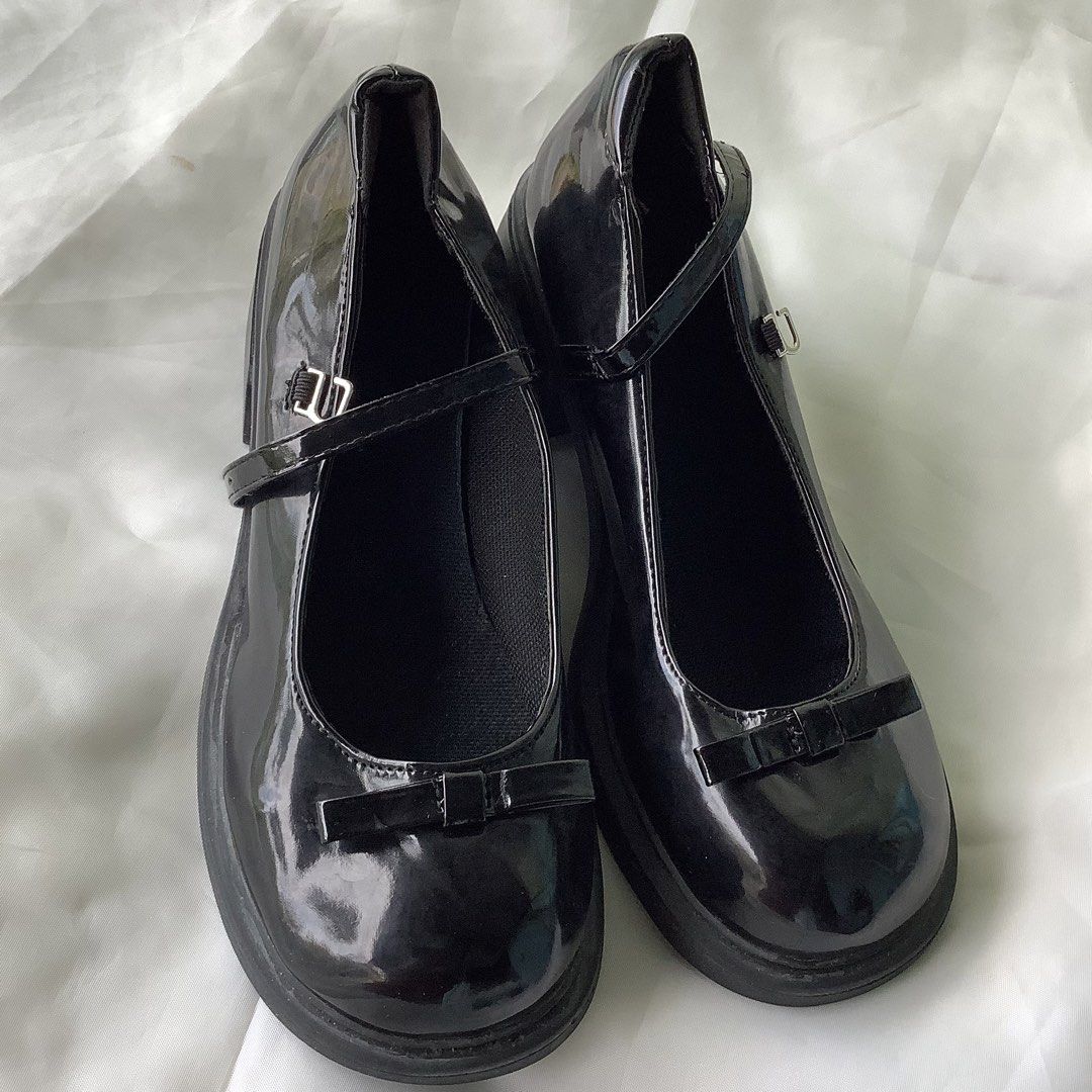 Black Mary Jane Shoes with Bow (Category: Heels) located in Cabanatuan. Submitted by chieezyx (Listing ID 1434894187, Image 1). Description: - Black Mary Jane shoes - Glossy finish - Small bow detail - Adjustable strap - Size 40 .