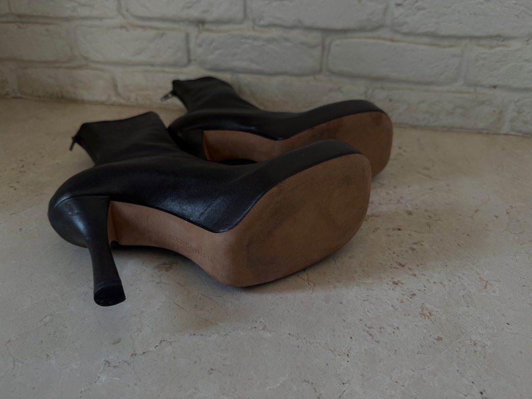 Bottega Veneta Bold Leather Ankle Boots (Category: Sneakers & Footwear) located in Pasig City. Submitted by x.declutter (Listing ID 1434930131, Image 3). Description: - Dark Chocolate Brown Color -HEEL: 9 CM - Back Zip Closure - VOLUMINOUS ROUNDED TOE - SOLE WITH PLATFORM - 100% LEATHER - MADE IN ITALY *last Photo for reference only AVAILABLE FOR SHIPPING FROM AUG 23-28 ONLY.
